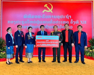 Unitel Donates 1.2 Billion Kip to Support 12th National Party Congress